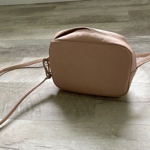 Blush colored H&M purse.